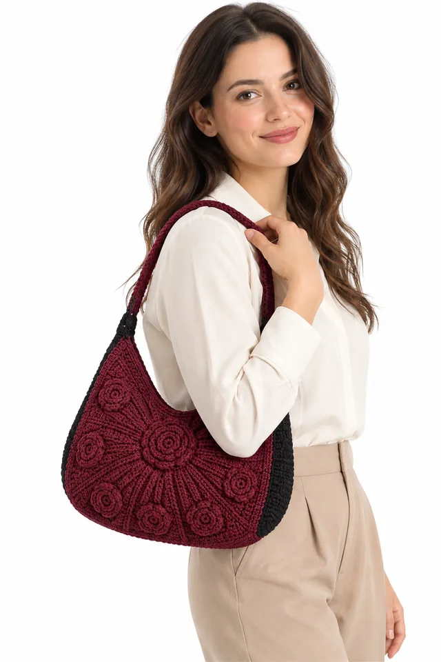 AI concept of a wine crochet shoulder bag with art deco sunray panels.